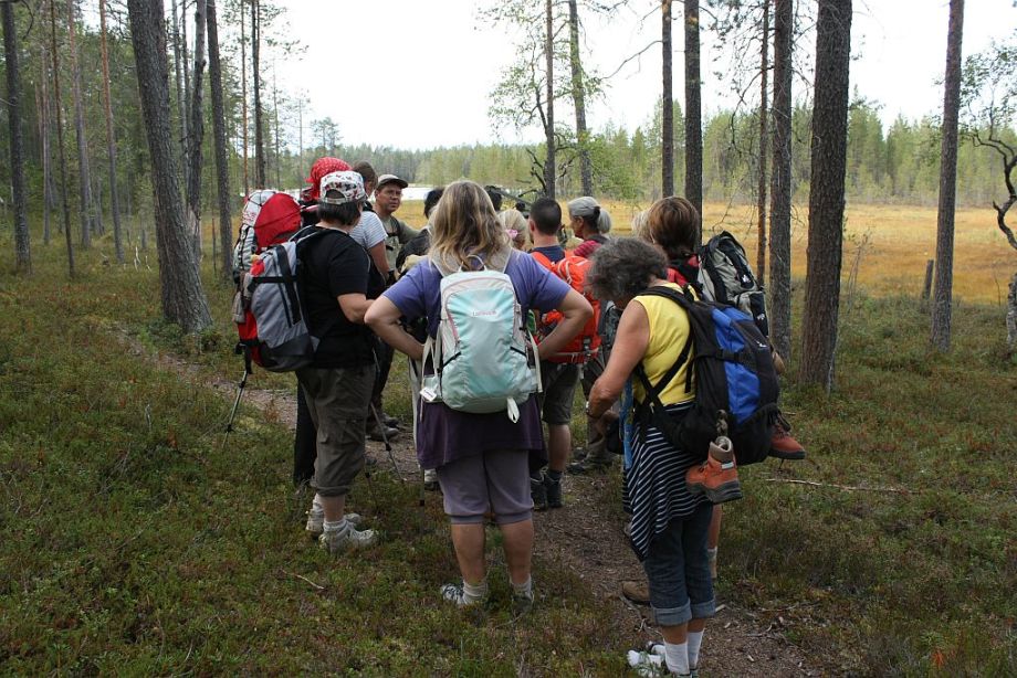 Guide explaining the group on a hiking tour.